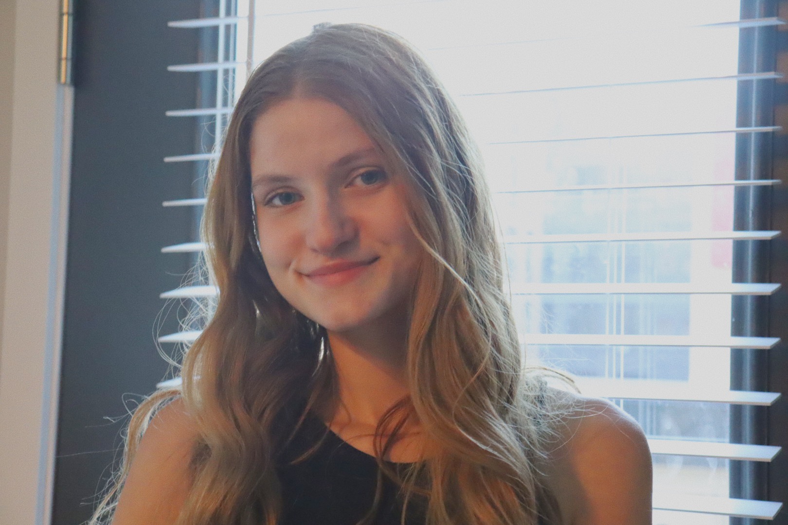 Headshot of Ari Valentin smiling.